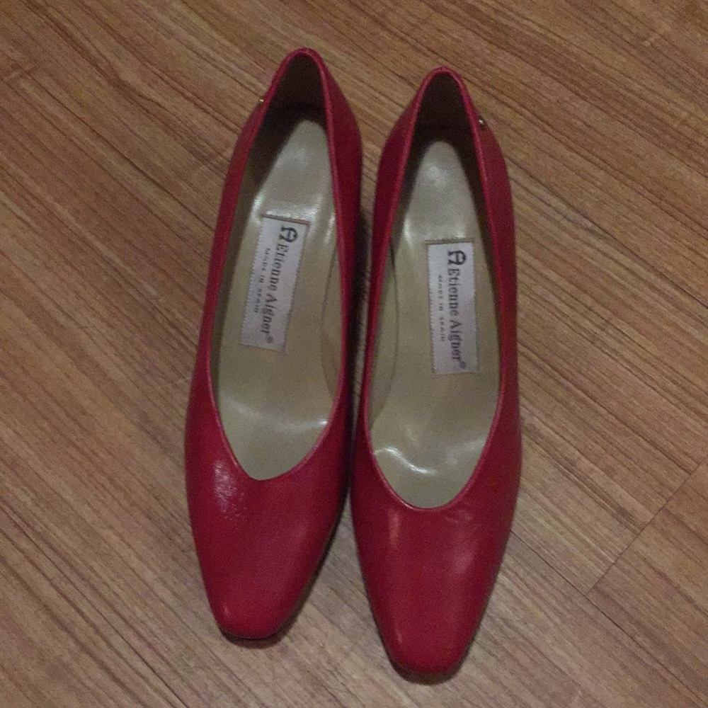 A Etienne Aigner women high heel shoe.